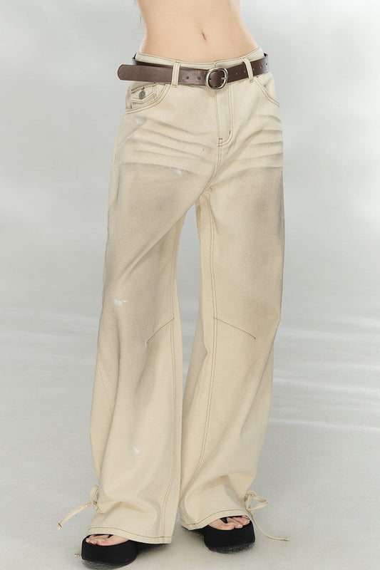 Distressed Bow-Tie Strap Jeans