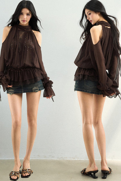 Blusa in tessuto velato e rete con strass