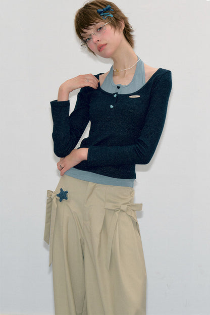 Top in maglia blu a maniche lunghe effetto stratificato