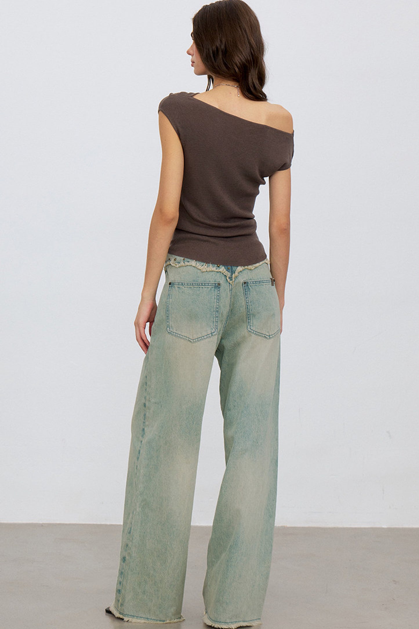 V-Shaped Raw Edge Rivet Denim Pants