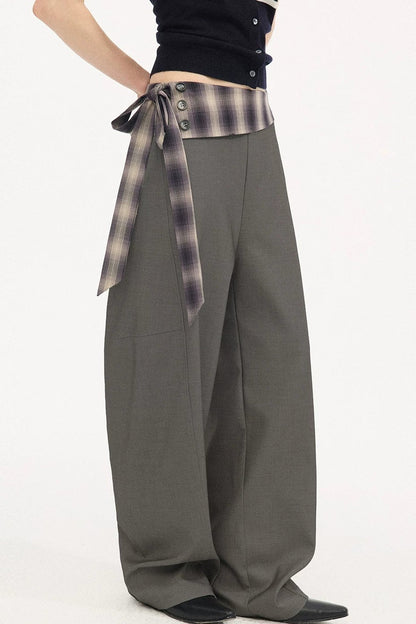 Pantalon à carreaux avec ceinture à nouer