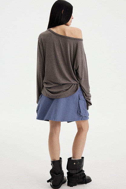 Top con strass effetto distressed con spalle scoperte