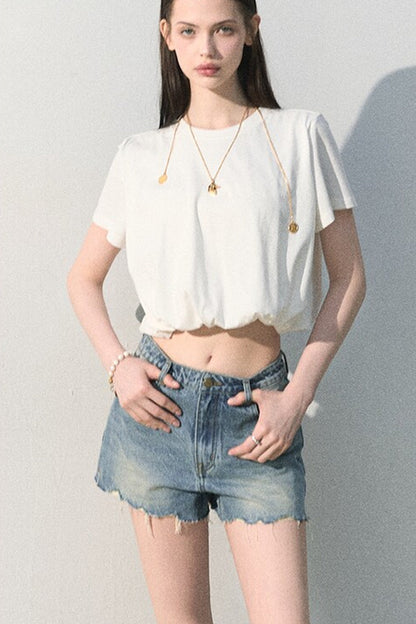 Blusa in lino plissettata a bocciolo