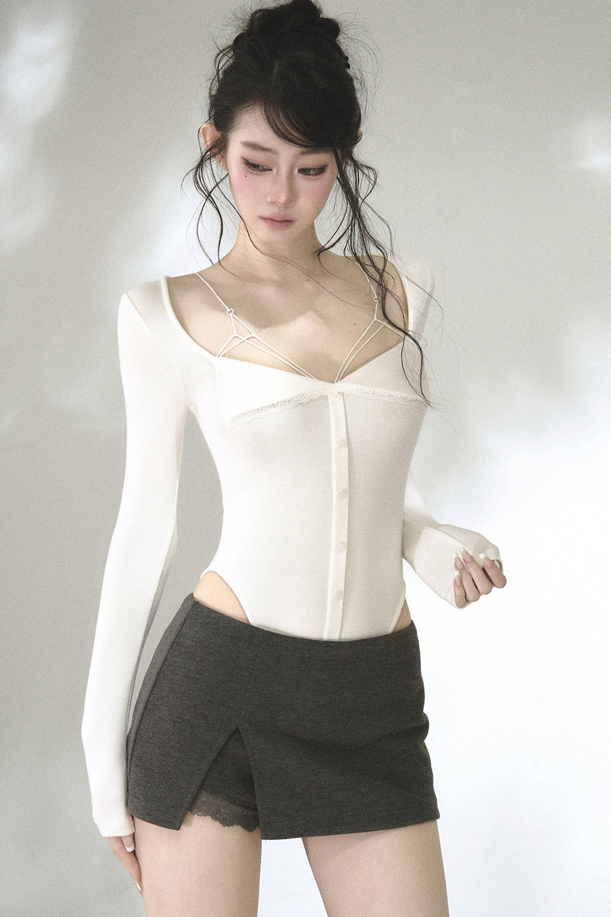 Body in maglia con orecchie da gatto e cintura da annodare