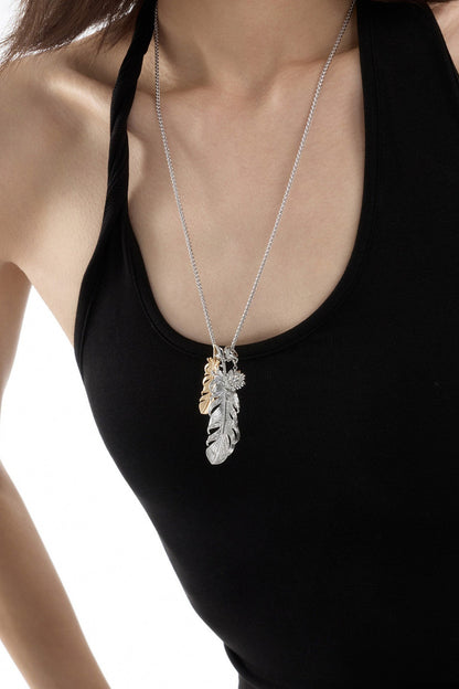 Collana a strati con piuma