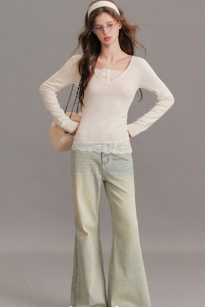 T-shirt in maglia a coste con scollo a V e strati effetto pizzo