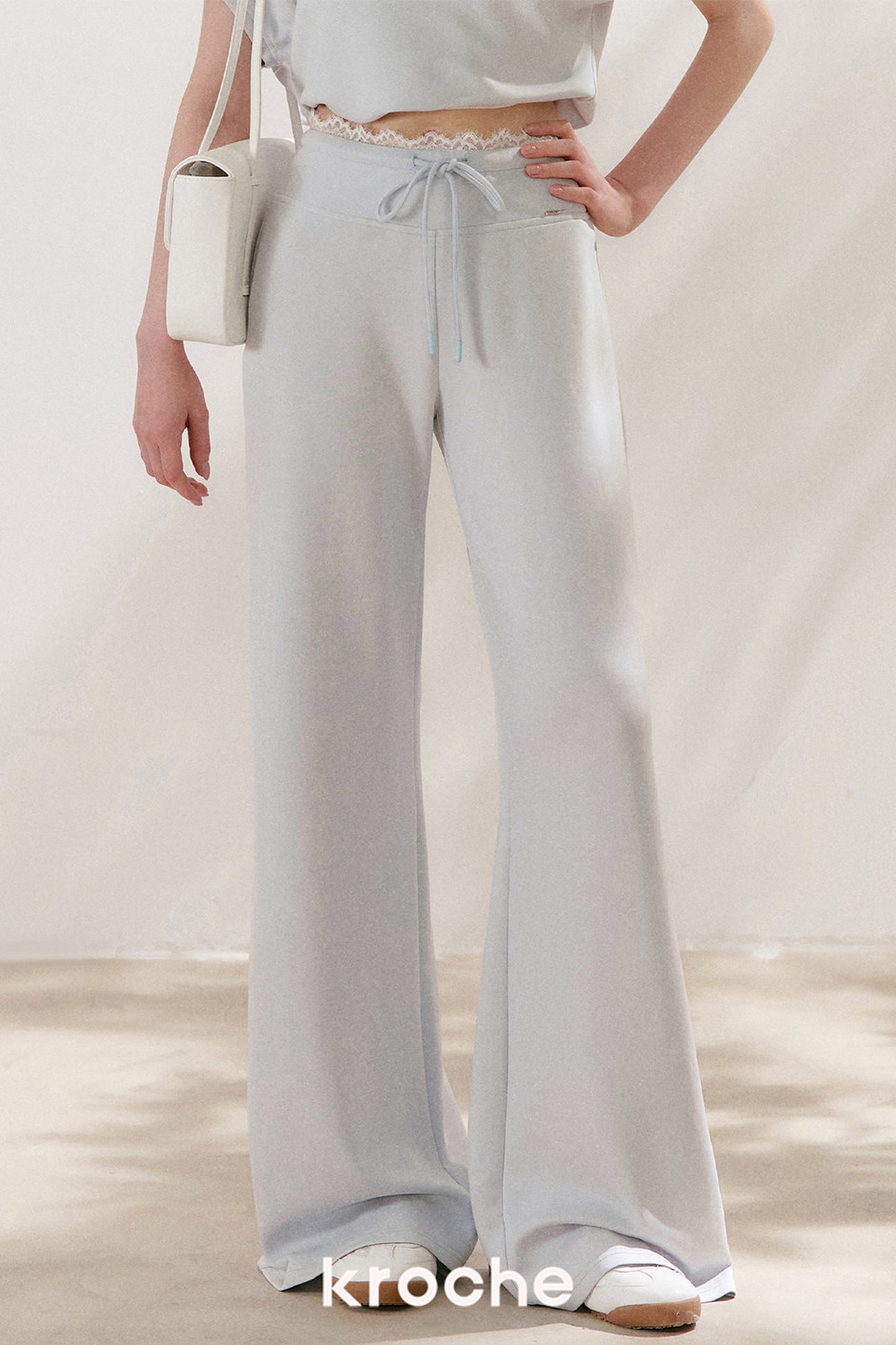 Conjunto de camiseta asimétrica y pantalones de capa de aire