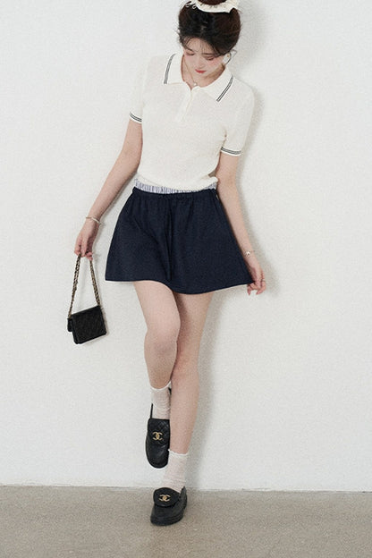 Ensemble tee-shirt polo en tricot blanc à manches courtes et jupe