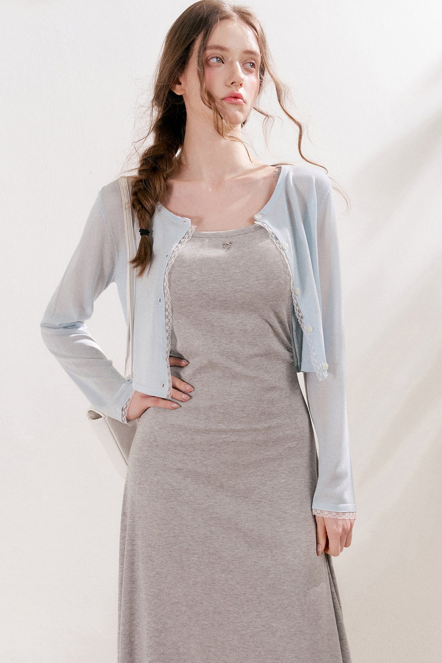 Cardigan in maglia trasparente 100% Lyocell con bordo in pizzo