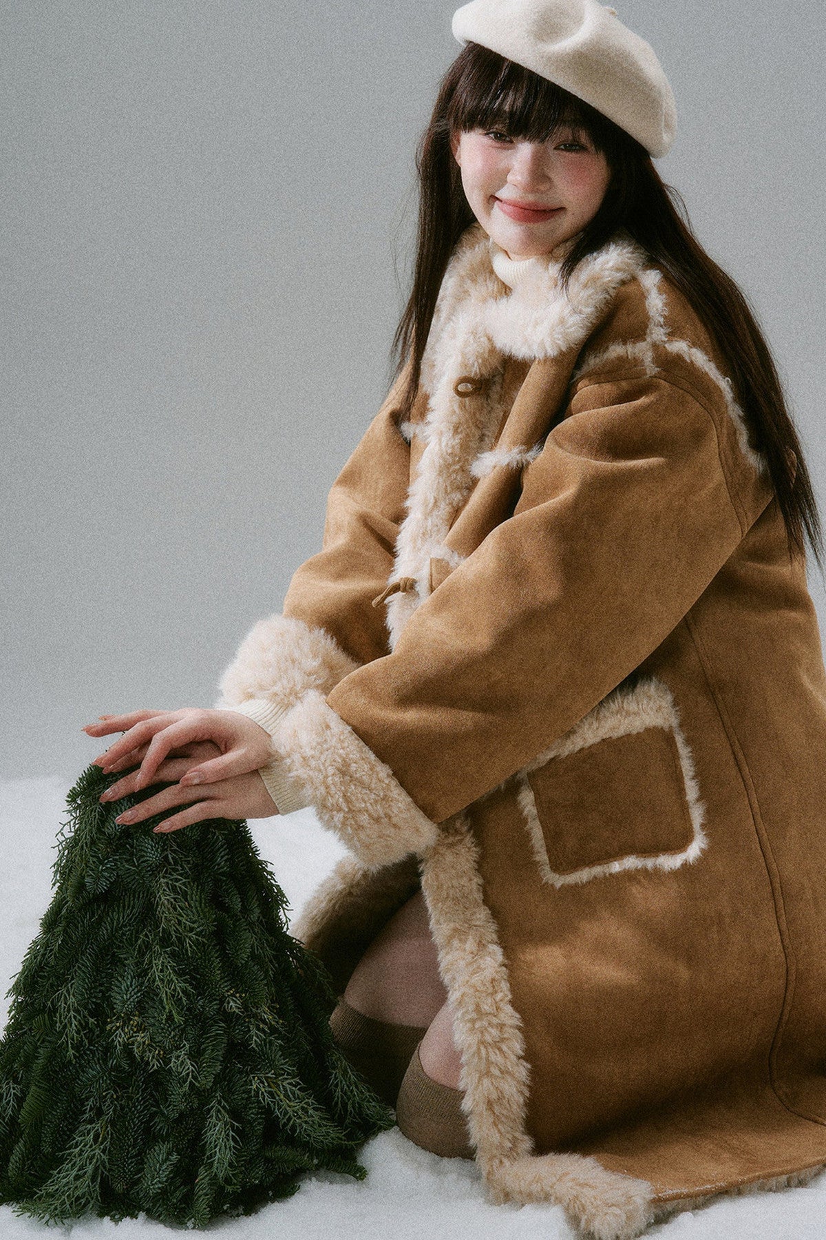 Manteau long à boutons en corne