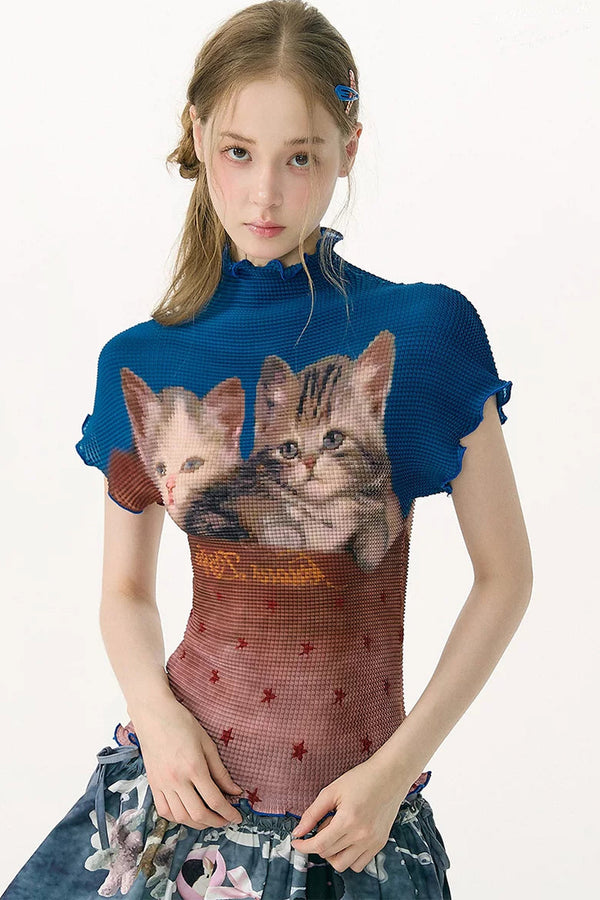 Blusa con estampado de gato y bloques de color