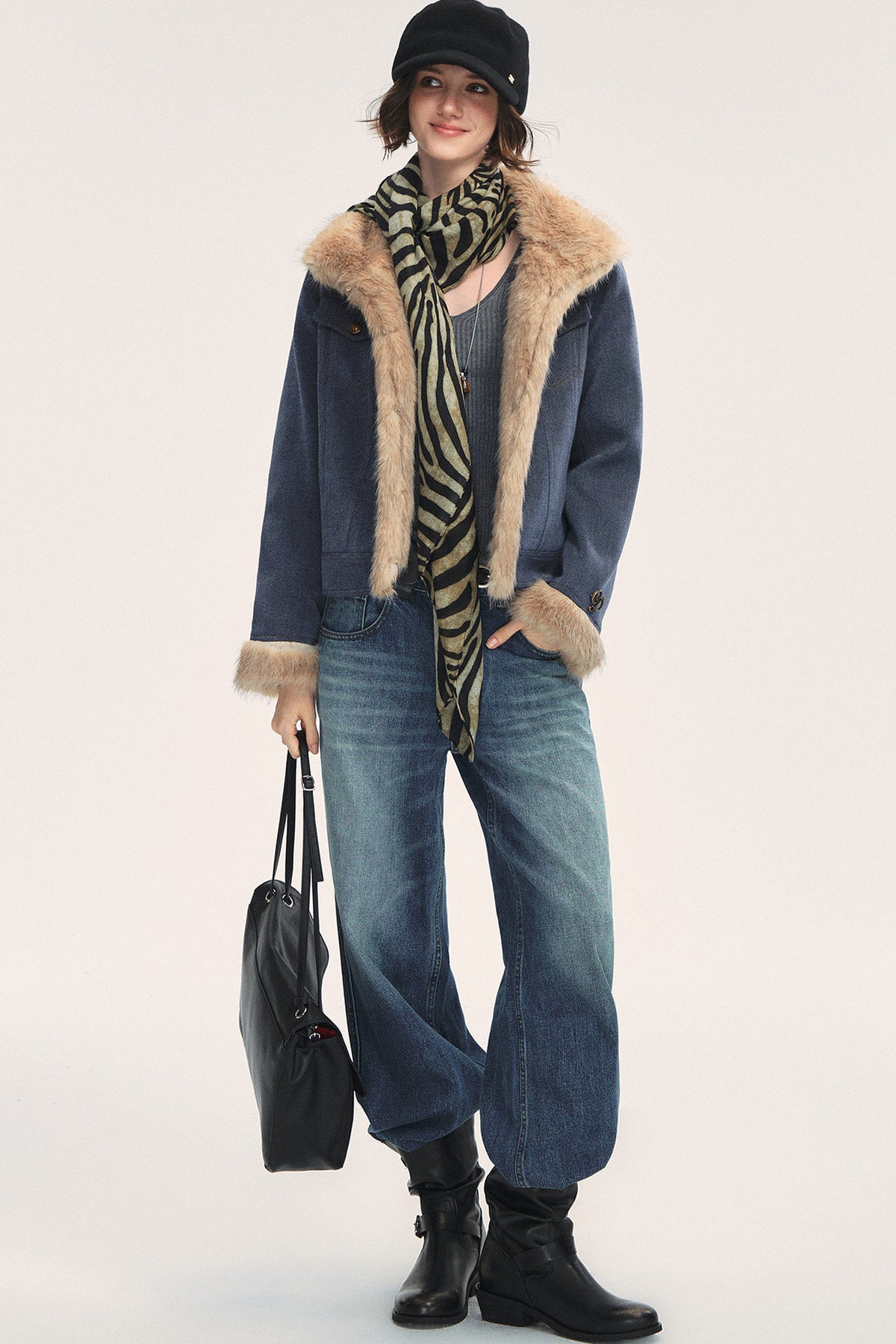 Jeansblaue Patchwork-Jacke mit Fellrevers