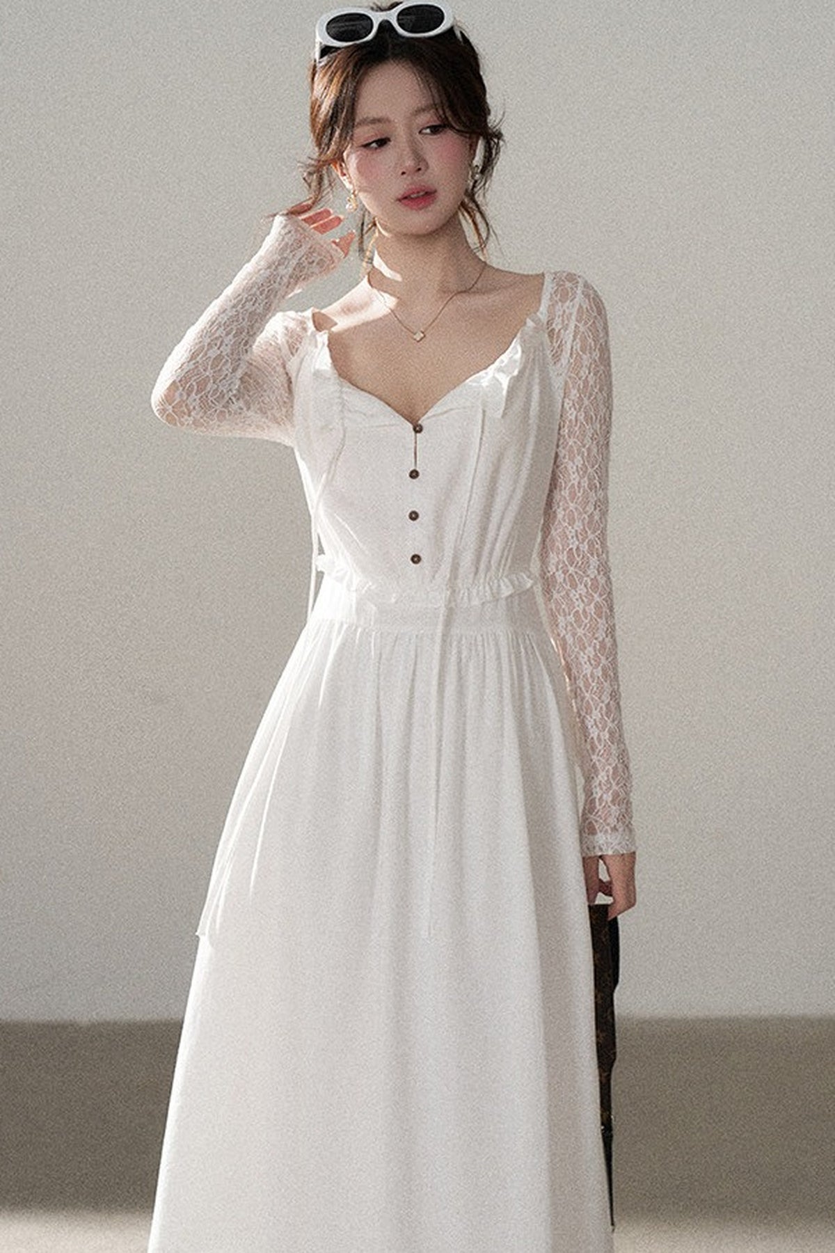 Robe trapèze en dentelle à boutons