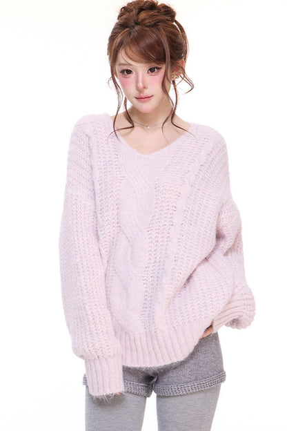 Pull ample en maille torsadée à col V