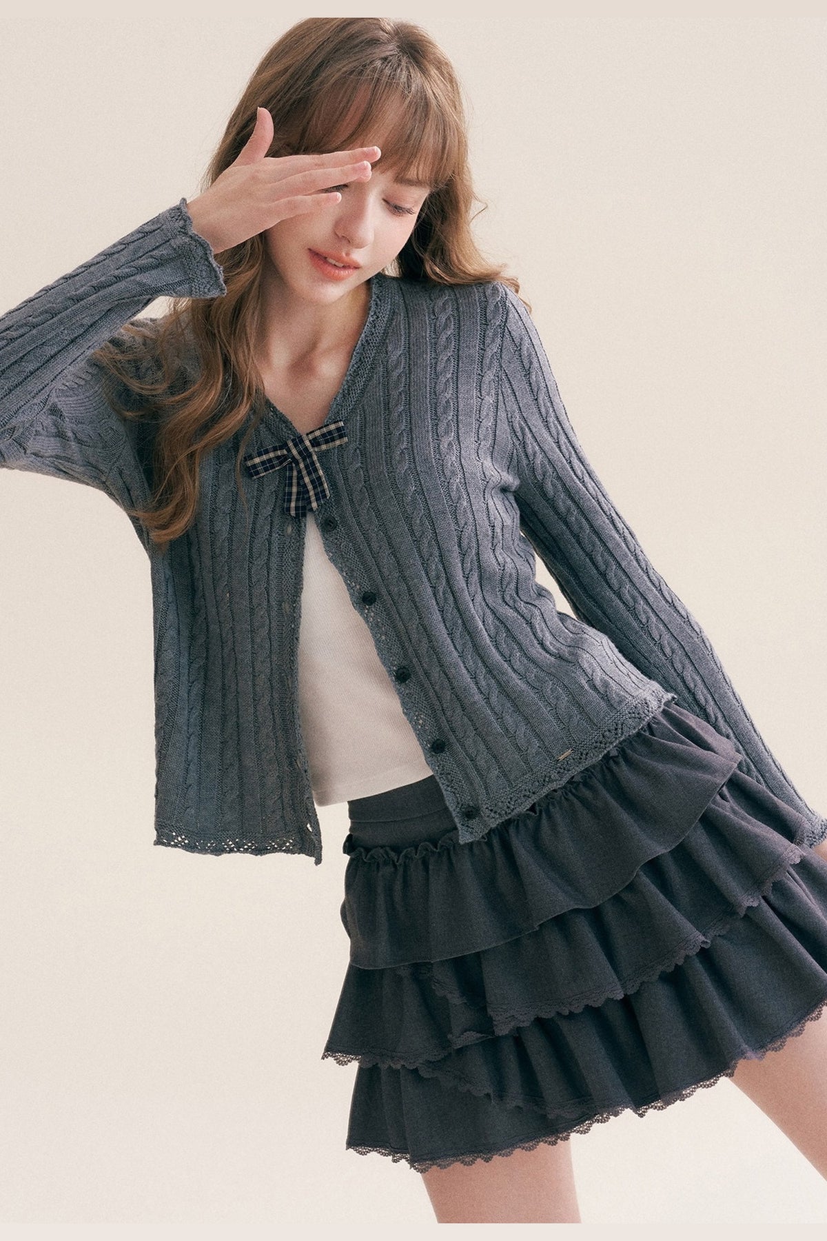 Cardigan à col en V à carreaux avec nœud