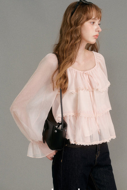 Blouse en mousseline à col carré et volants