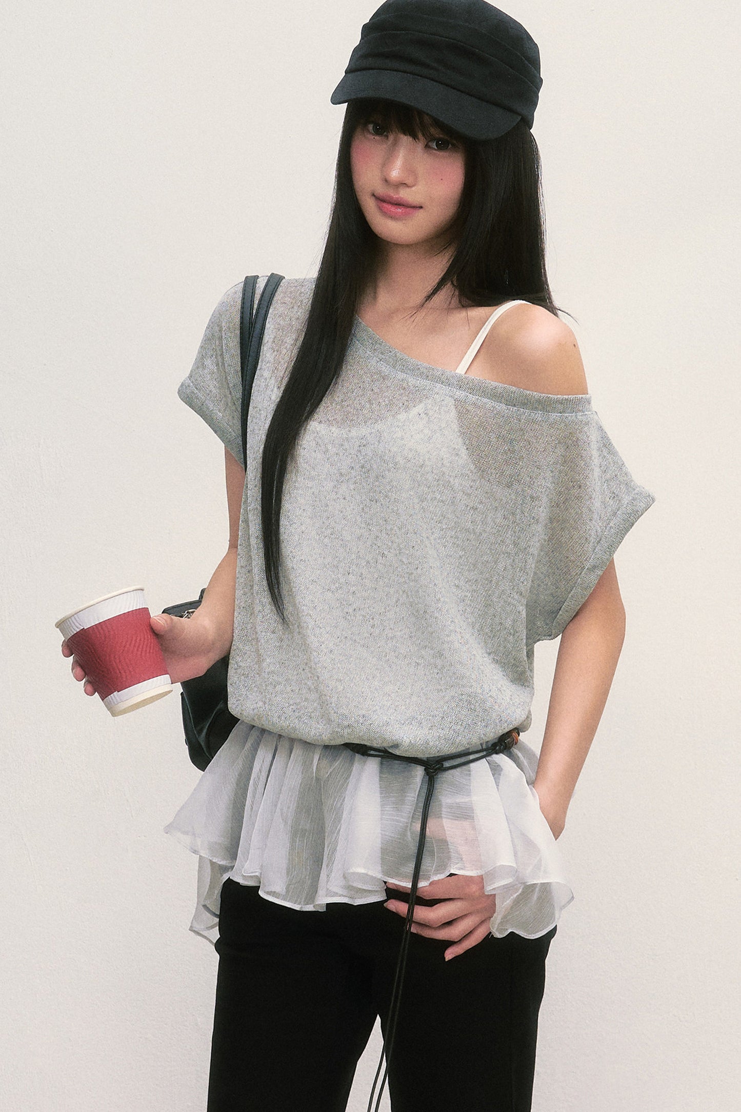Top con inserti e spalle scoperte