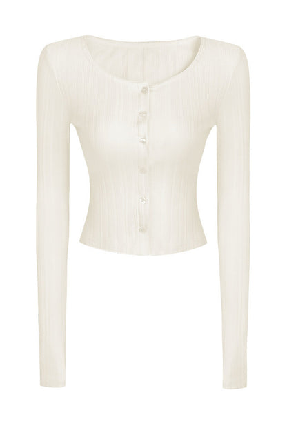 Completo con cardigan smanicato e pantaloni eleganti