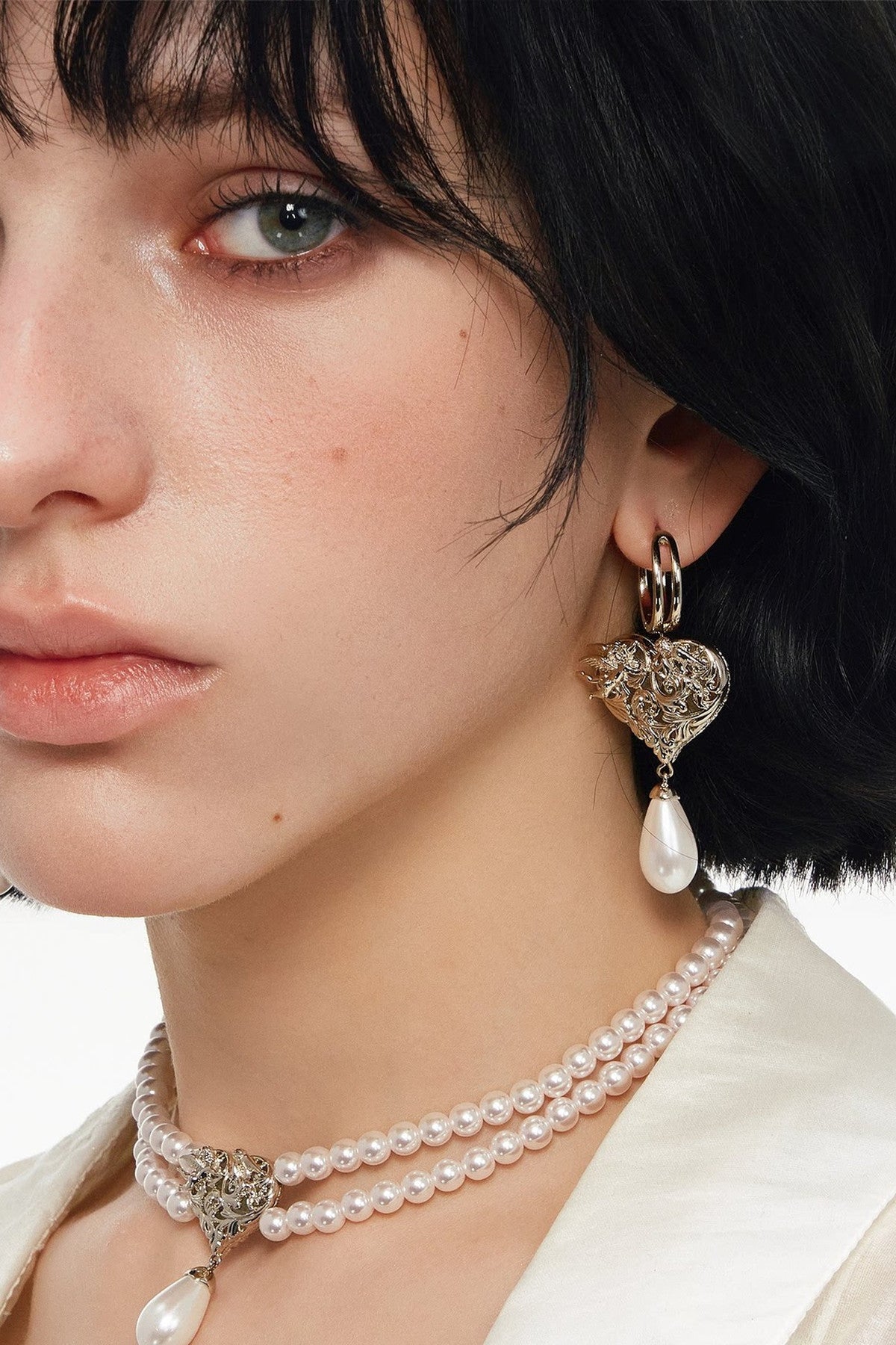 Double-Sided Rotating Heart Angel Pearl Earrings
