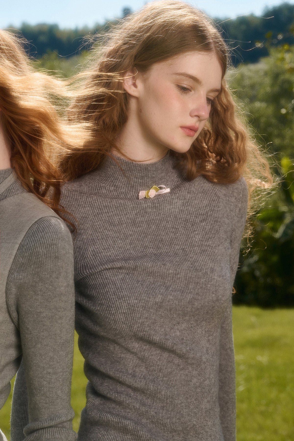 Maglione a maglia con fiocco
