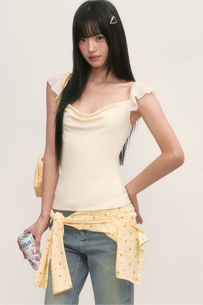 Top con cuello drapeado y mangas con volantes