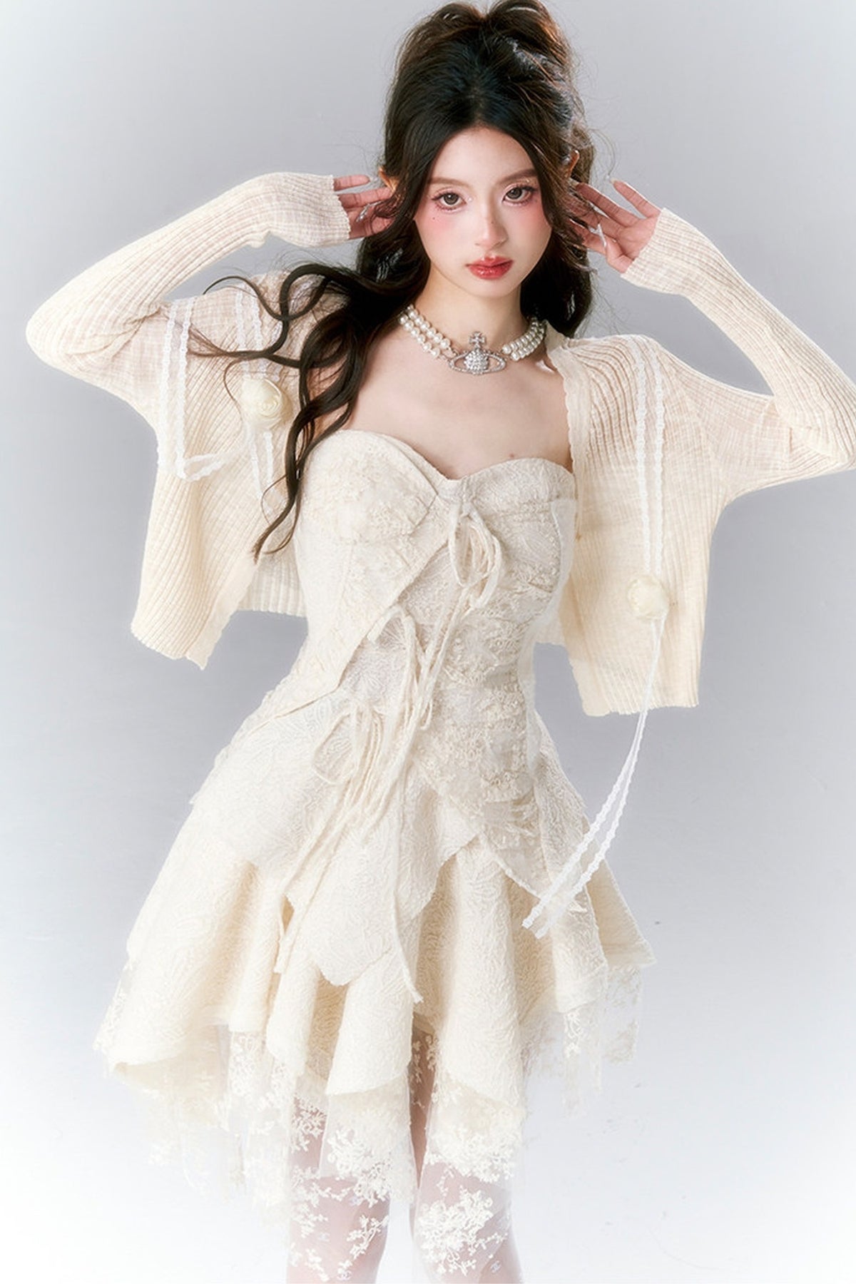 Pompon-Strickjacke