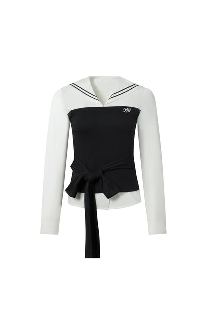 Marineblaues Set aus Bluse mit Kragen und Punkten