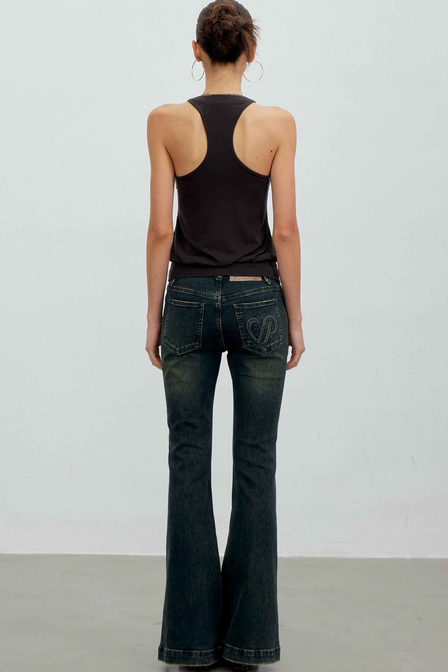 Heart Button Slit Flared Jeans