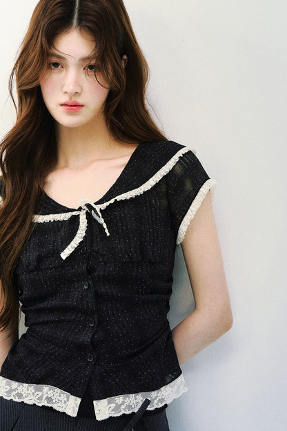 Blusa retrò blu navy a pois