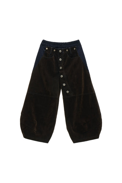 Jeans cropped a quadri con applicazioni floccate e a toppe