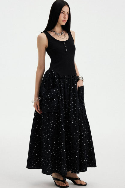 Vestido maxi evasé sin mangas de lunares