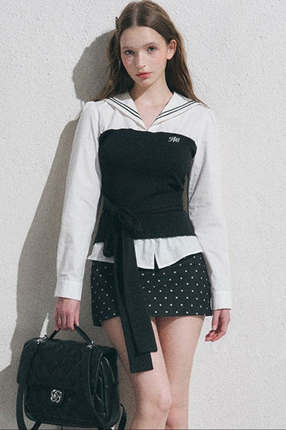 Marineblaues Set aus Bluse mit Kragen und Punkten