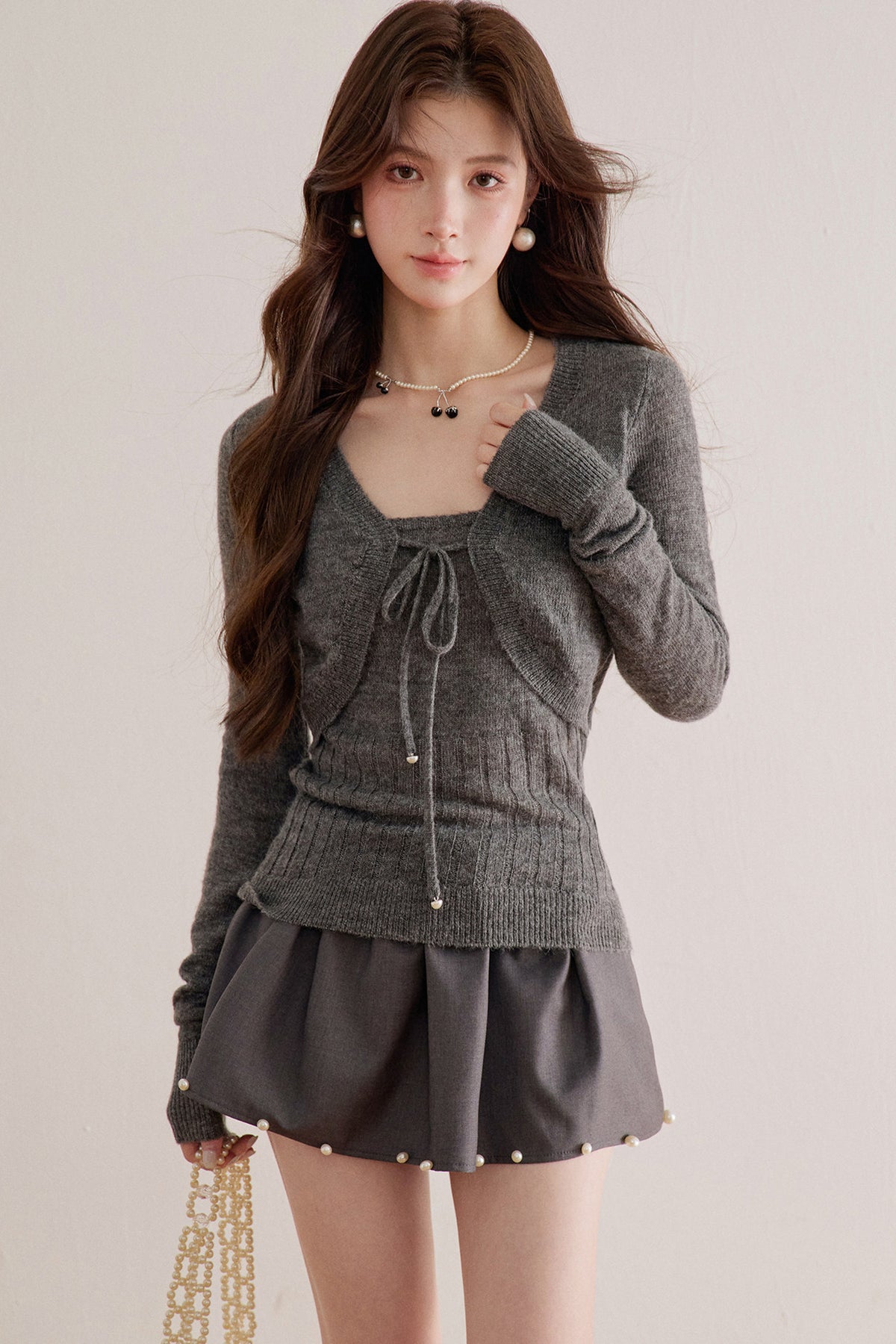 Long-Sleeve V-Neck Lace-Up Knit Sweater
