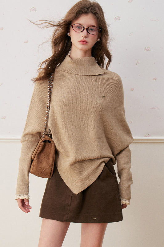 Maglione con maniche a pipistrello e collo ripiegato