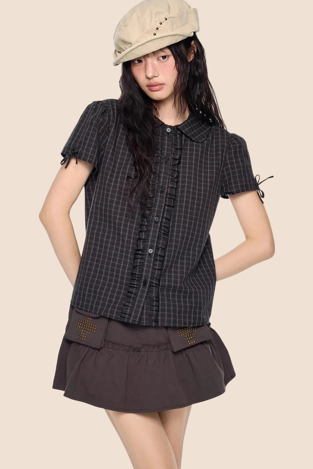 Camicia a righe con fiocco plissettato
