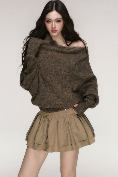 Pullover aus grobem Strick mit schrägem Ausschnitt und freien Schultern