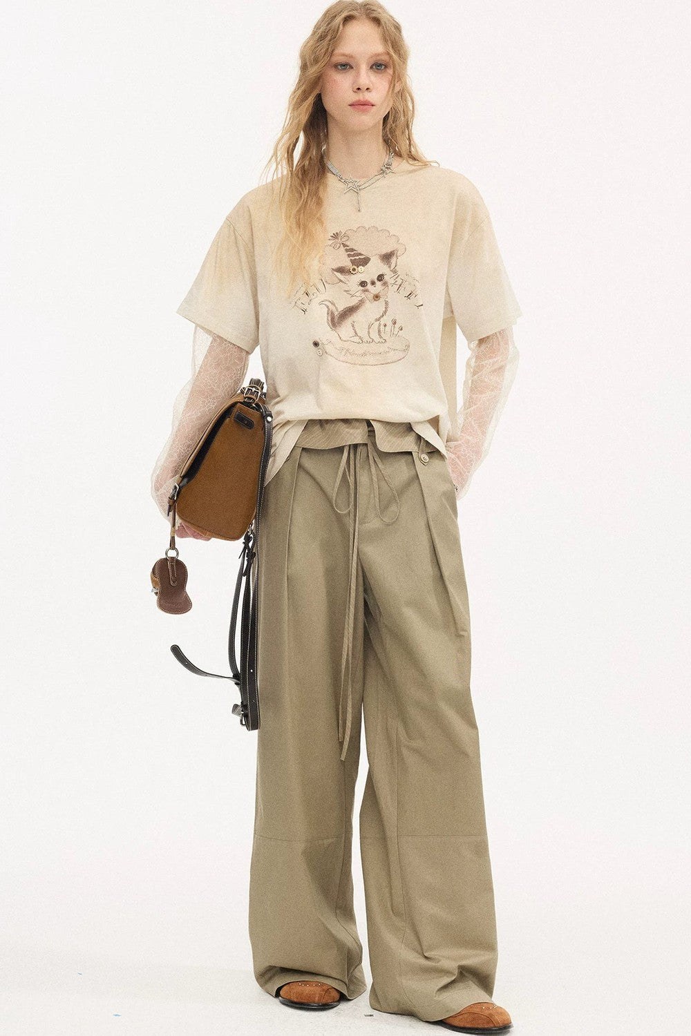Pantalon droit à rayures et empiècements