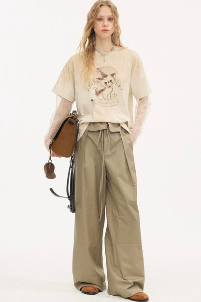 Pantalon droit à rayures et empiècements