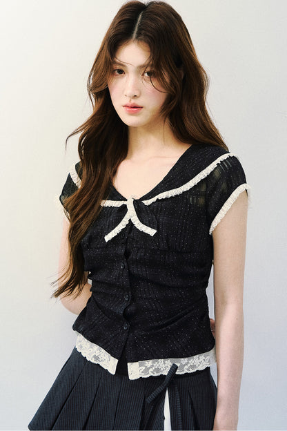Blusa retrò blu navy a pois