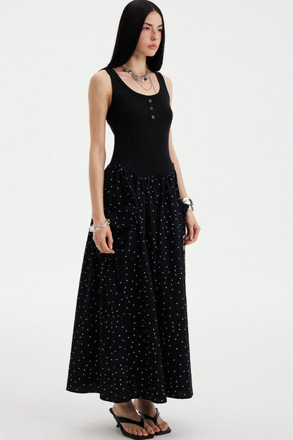Vestido maxi evasé sin mangas de lunares