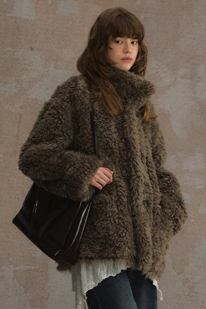 Wendbare flauschige Lammwolljacke