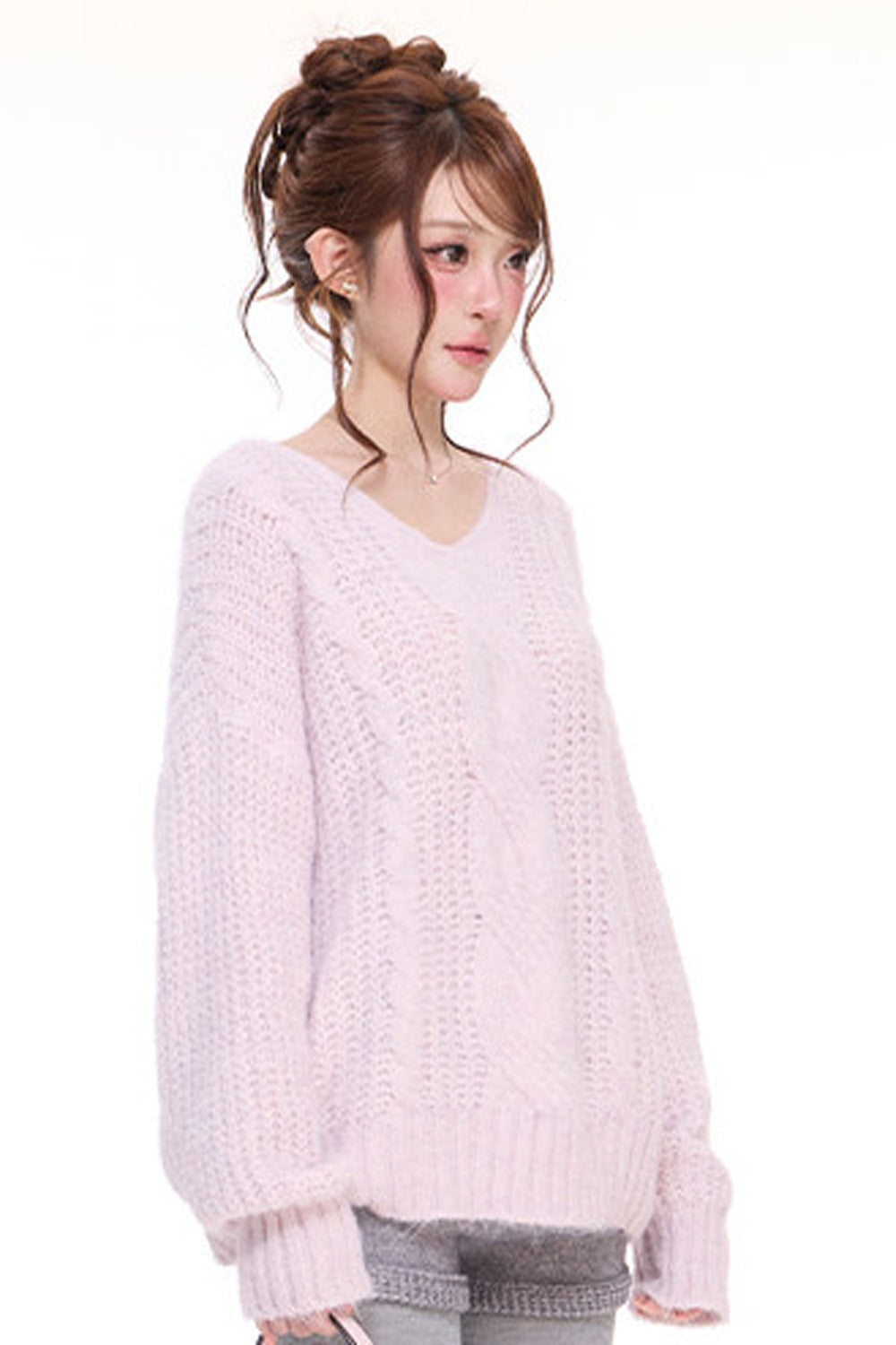 Pull ample en maille torsadée à col V