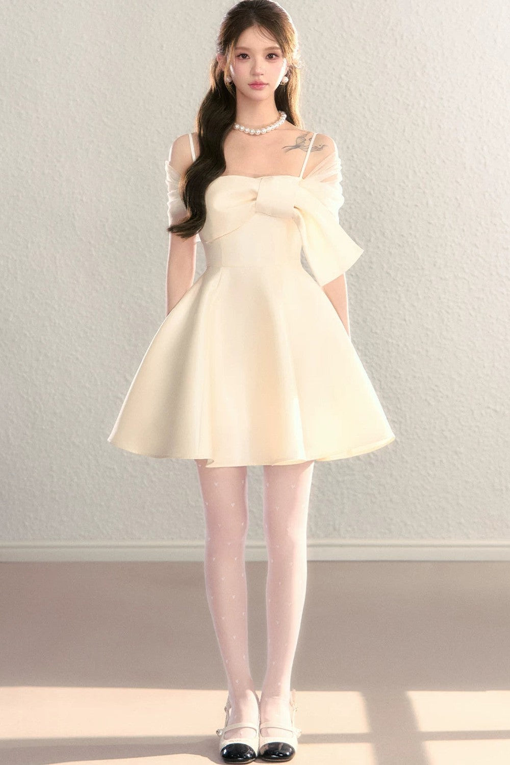 Abito da sera in tulle con spalle scoperte