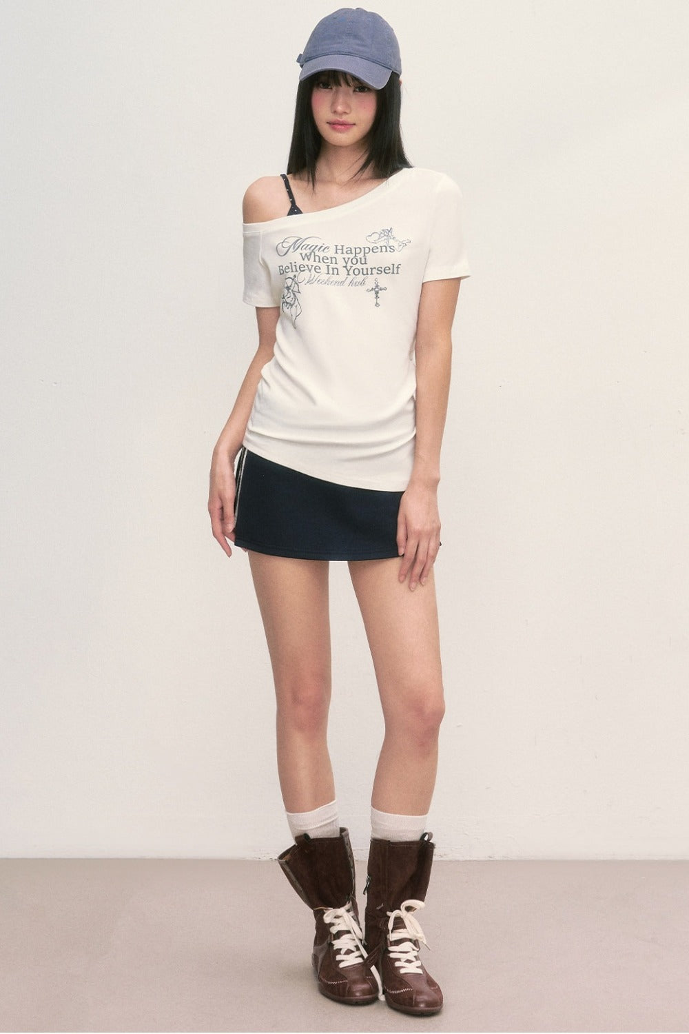 Blusa con efecto de capas y estampado de Cupido