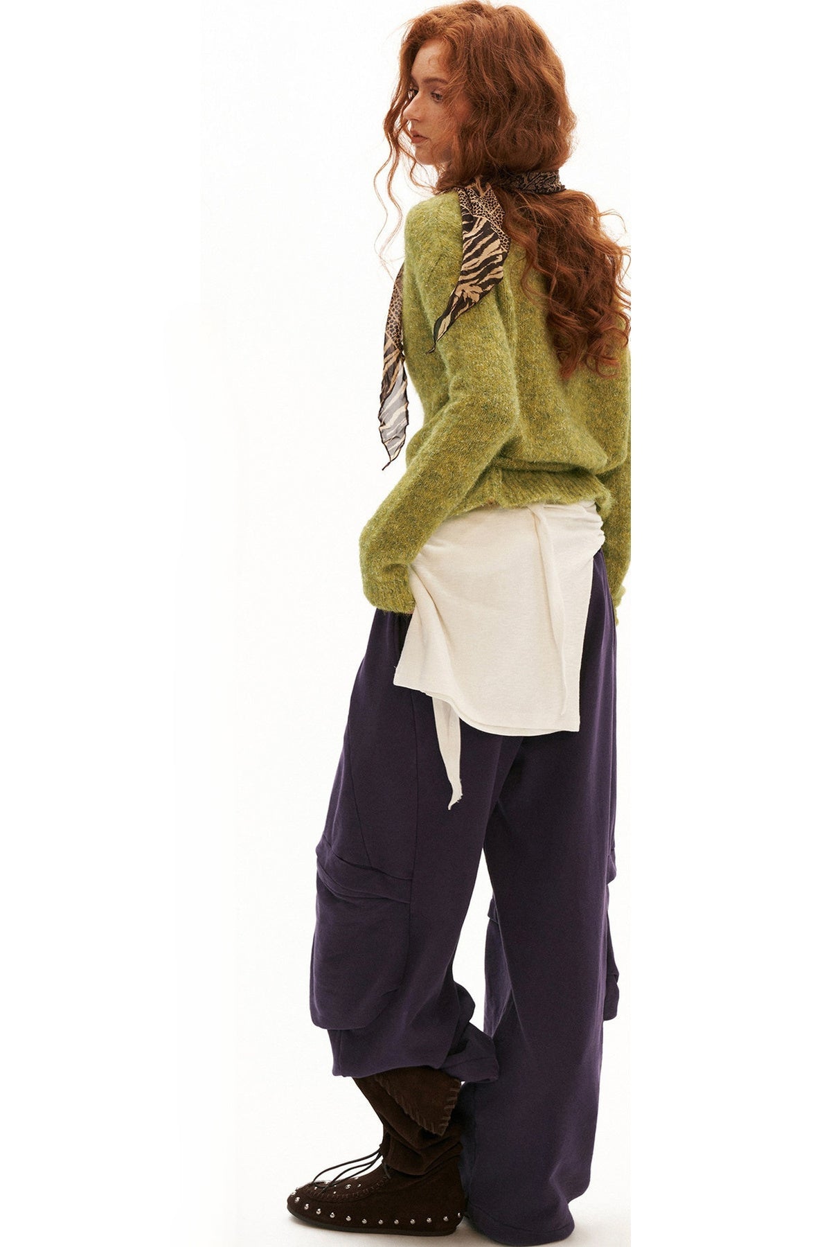 Pull en maille à boutons et liens croisés