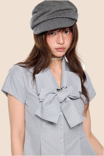 Blusa preppy a righe con fiocco