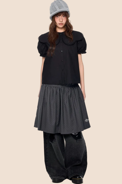 Blusa con cuello de encaje y mangas abullonadas