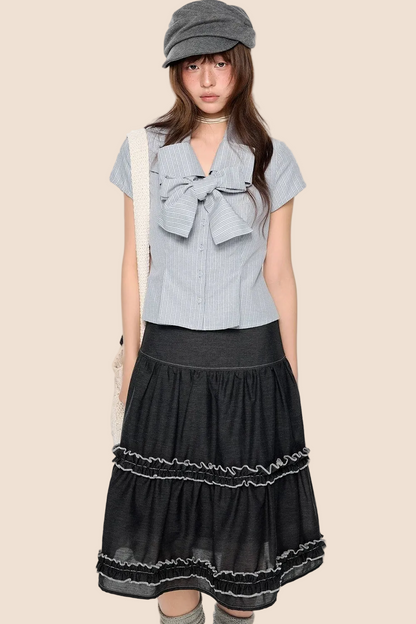 Blusa preppy a righe con fiocco