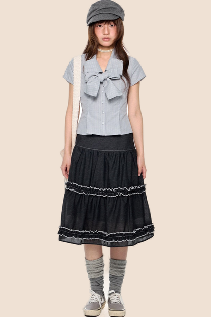 Blusa preppy a righe con fiocco