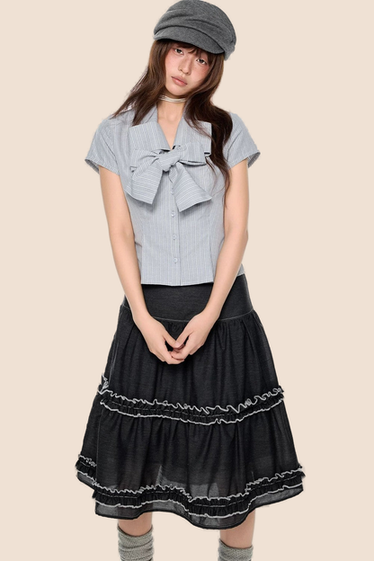 Blusa preppy a righe con fiocco
